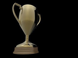 Gold trophy on black background