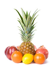 Pineapple, lemon, orange, apple and pomegranate