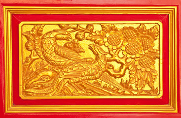 Details of wood carving door of church in temple.