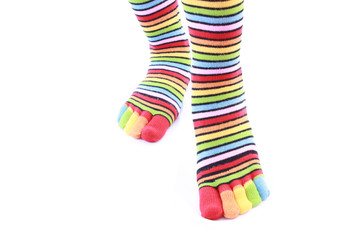 woman legs in strip sock on white background