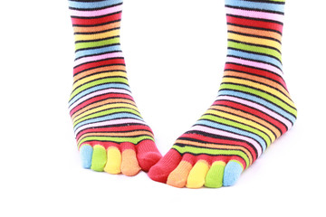 woman legs in strip sock on white background