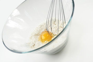 Whisking eggs with flour