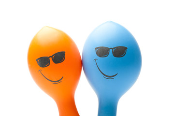 two smiley ballons