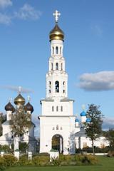 Fototapeta na wymiar Orthodox church with a bell tower in Russia