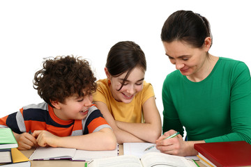 Kids doing homework isolated on white background