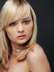 Fototapeta premium Close-up portrait of sexy young blond woman