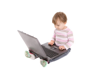 happy baby with laptop