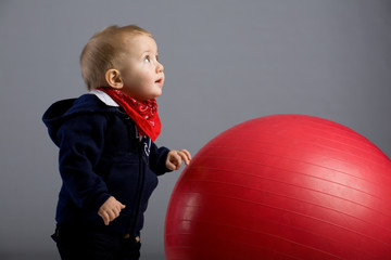 Toddler boy and ball