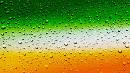Panele Szklane  Irlandzka flaga na szklance piwa z bąbelkami
