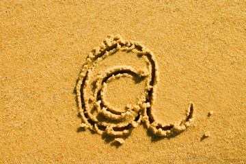 Fototapeta na wymiar na znak na piasku