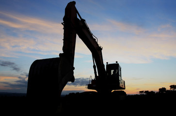 Excavator at sunset