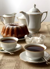 cake and cups of tea