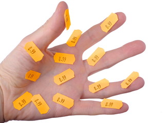 Hand with price tickets