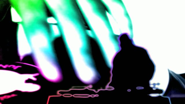 Siluete of scratching dj.