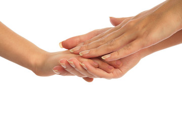 Mother holding hand of child