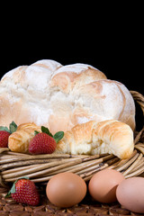Fresh Bread, Croissants, Strawberries And Eggs