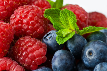 Blueberry and rasperry with mint leaves