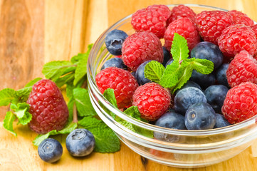 Blueberry, ruspberry and mint leaves