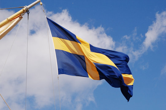 Flag of Sweden on a background of the sky