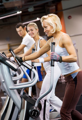 Fototapeta premium Group of people jogging in a gym
