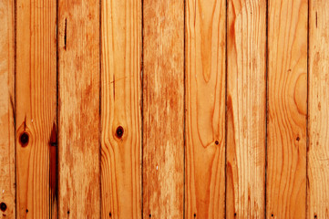 Fototapeta premium Wooden fence made of unfinished pine boards