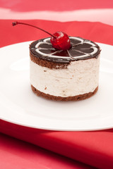 fancy cake with cherry