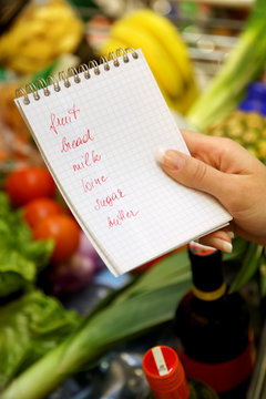 Shopping at the supermarket with a shopping list, english