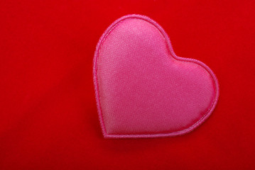 Obraz premium Pink fabric heart red background love valentine romance celebration gift valentn
