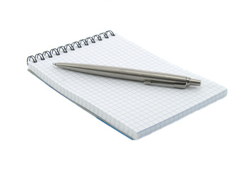 Noutbook and pen on it isolated over white