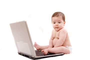 baby working on laptop
