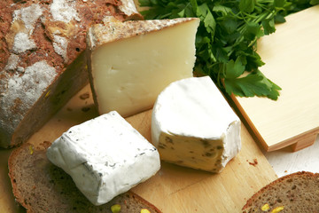delicatessen cheese on wood