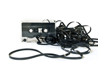 Old audio cassette on white