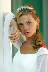 Beautiful bride portrait, wearing tiara with blond hair. © Speedfighter
