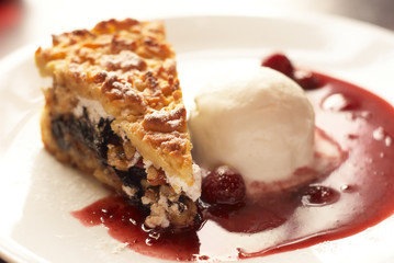 Cake with ice cream and strawberry