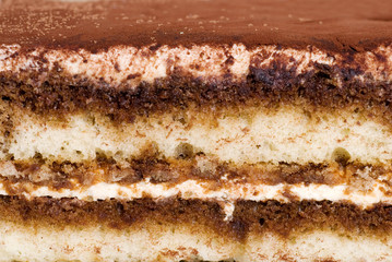 close up tiramisu cake making a background
