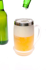 Beer mug and bottle on white background