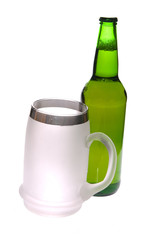 Beer mug and bottle on white background