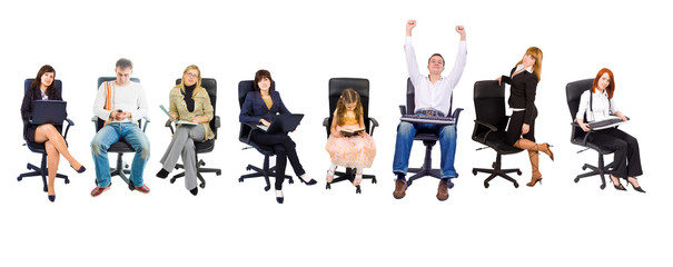 Several people in office chairs