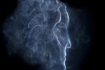 A man's profile from smoke © Alla Salamaha