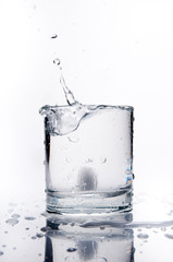 Glass of splashing water