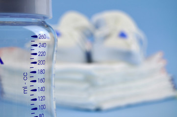 Baby Bottle and Blue Shoes