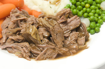 pot roast dinner mashed potatoes carrots green peas