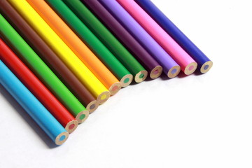colored pencils on white background