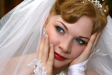 Young beautiful bride with red hair