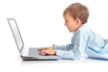 Boy playing with laptop