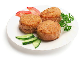 Fried meatballs with slices of cucumbers, parsley