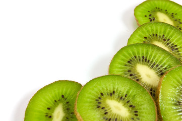 Slice of kiwi fruit on white background