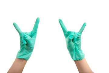 Hands in surgical gloves make corna