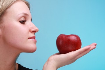 woman with red apple