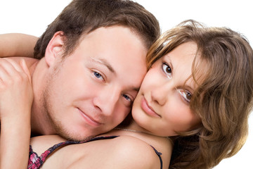 Portrait of the young beautiful couple. Isolated